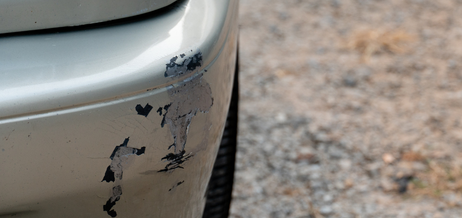 Car with a scratched bumper